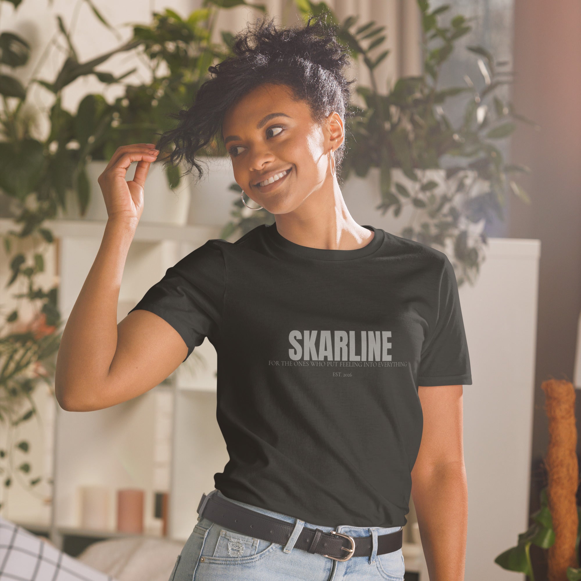 Skarline Tee in Black — front view logo t-shirt