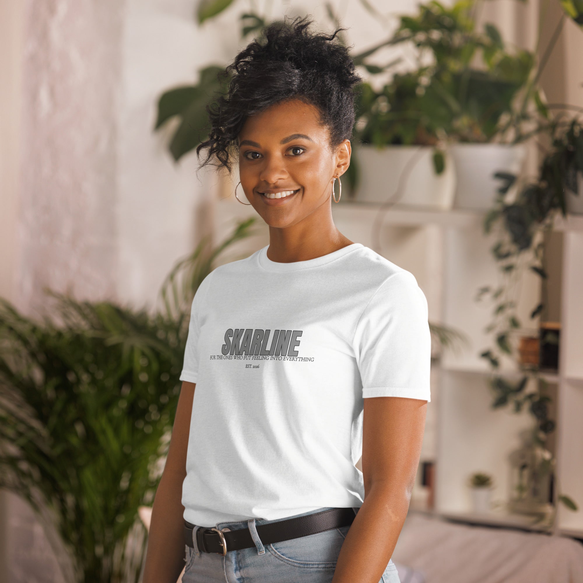 Skarline Tee in White — angled front view